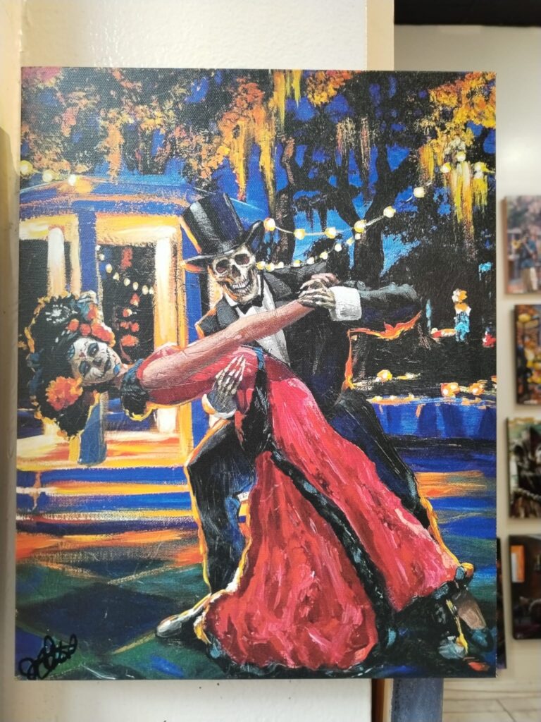 Voodoo slika kostura u smokingu i crvenoj haljini kako plešu